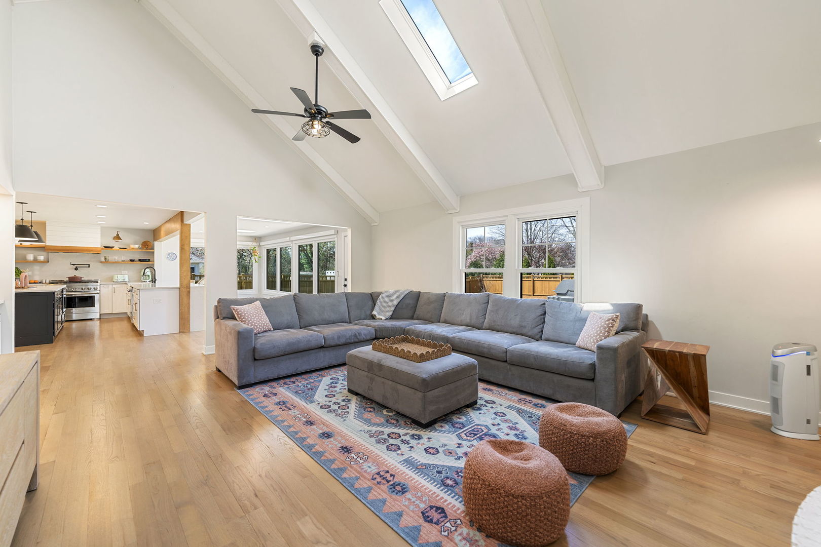 675 Cavalcade Circle Naperville, IL 60540 - Photo 15 of 58 a living room with furniture and a wooden floor