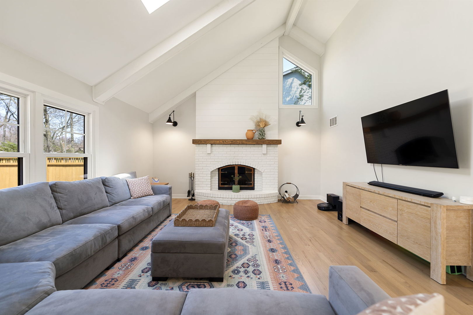 675 Cavalcade Circle Naperville, IL 60540 - Photo 16 of 58 a living room with furniture and a flat screen tv