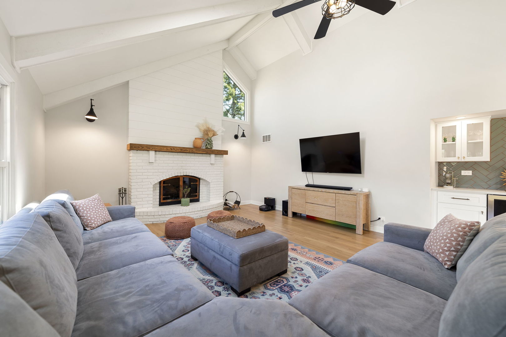675 Cavalcade Circle Naperville, IL 60540 - Photo 18 of 58 a living room with furniture and a fireplace