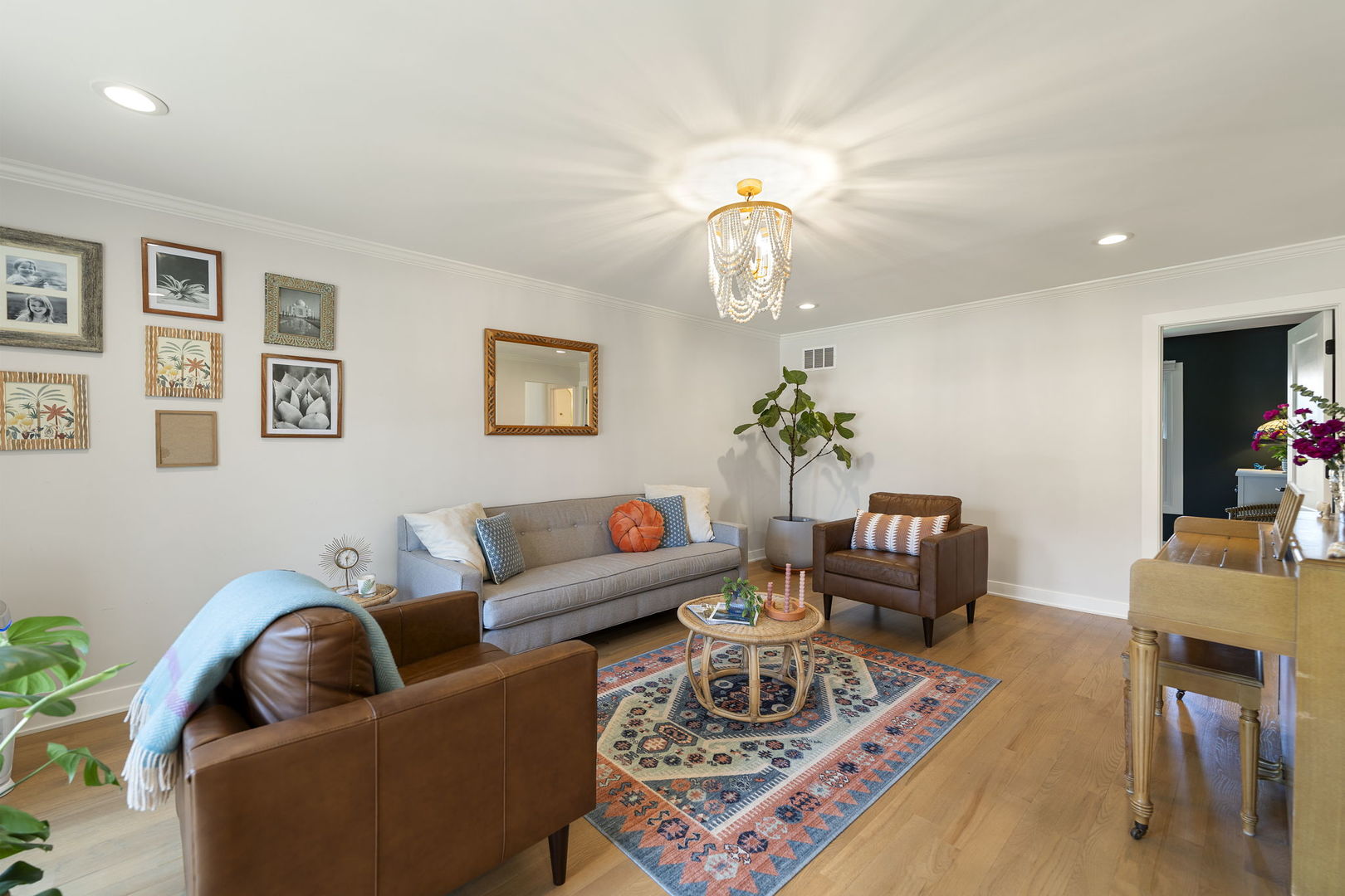 675 Cavalcade Circle Naperville, IL 60540 - Photo 20 of 58 a living room with furniture potted plant and wooden floor