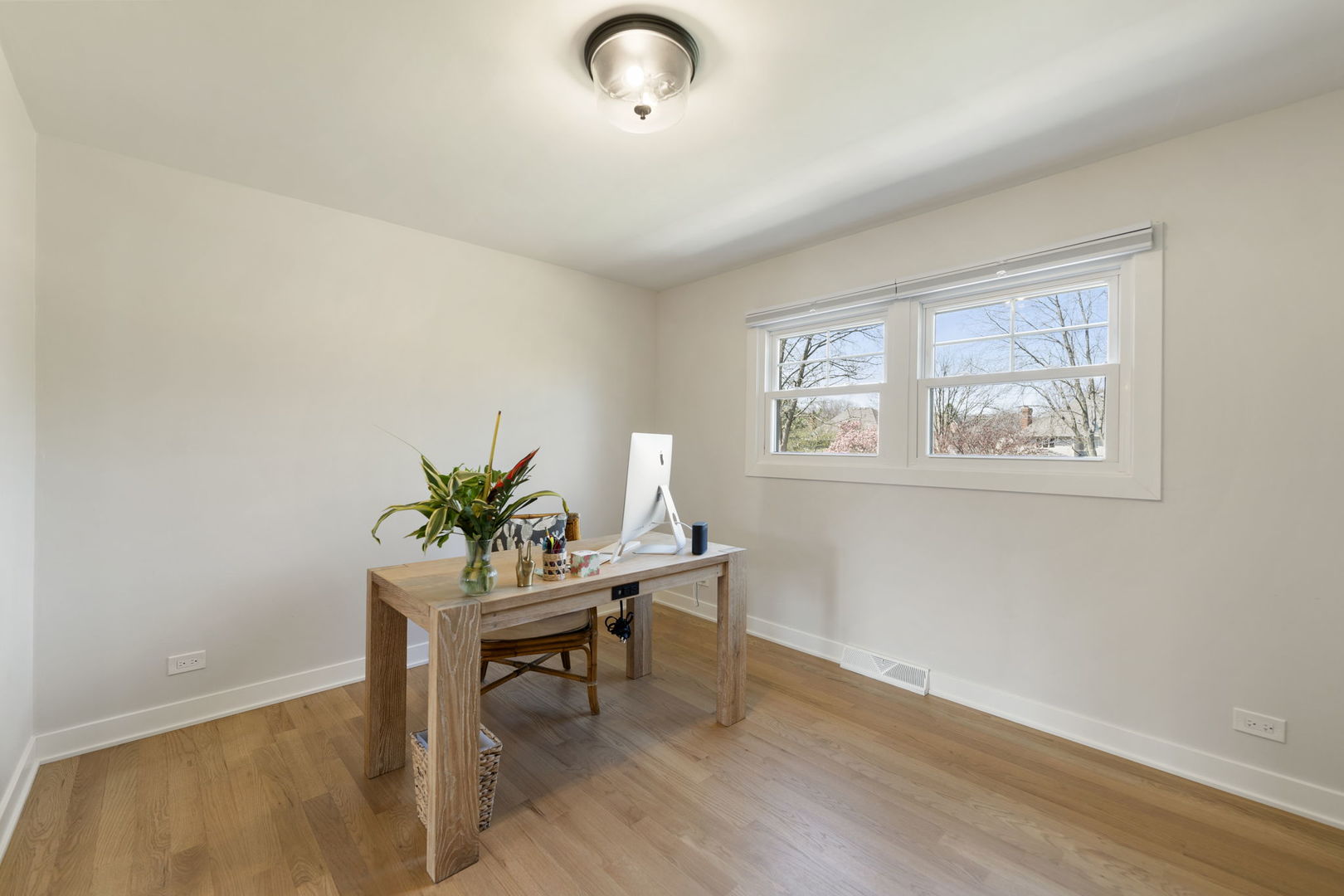 675 Cavalcade Circle Naperville, IL 60540 - Photo 29 of 58 a workspace room with furniture and a potted plant