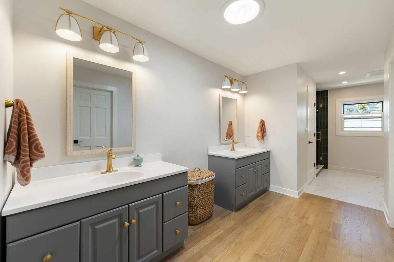 675 Cavalcade Circle Naperville, IL 60540 - Photo 31 of 58 a bathroom with a sink vanity and mirror