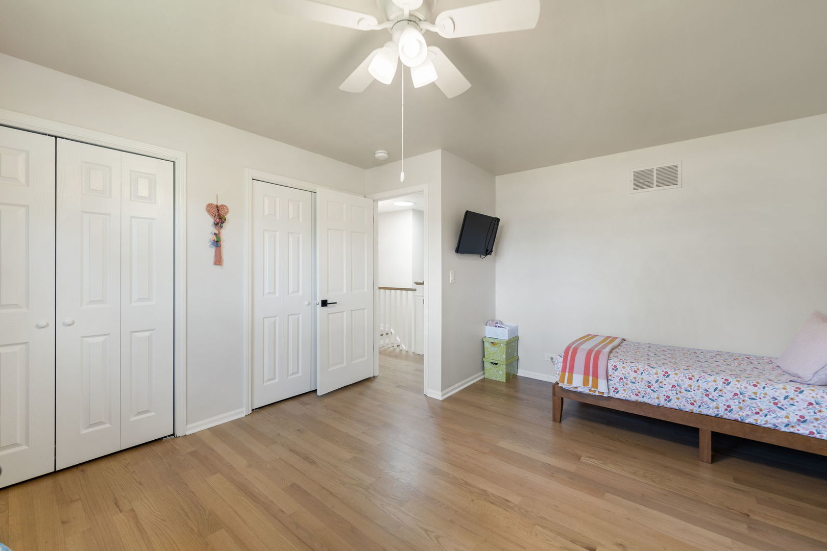 675 Cavalcade Circle Naperville, IL 60540 - Photo 37 of 58 a view of room with wooden floor and ceiling fan