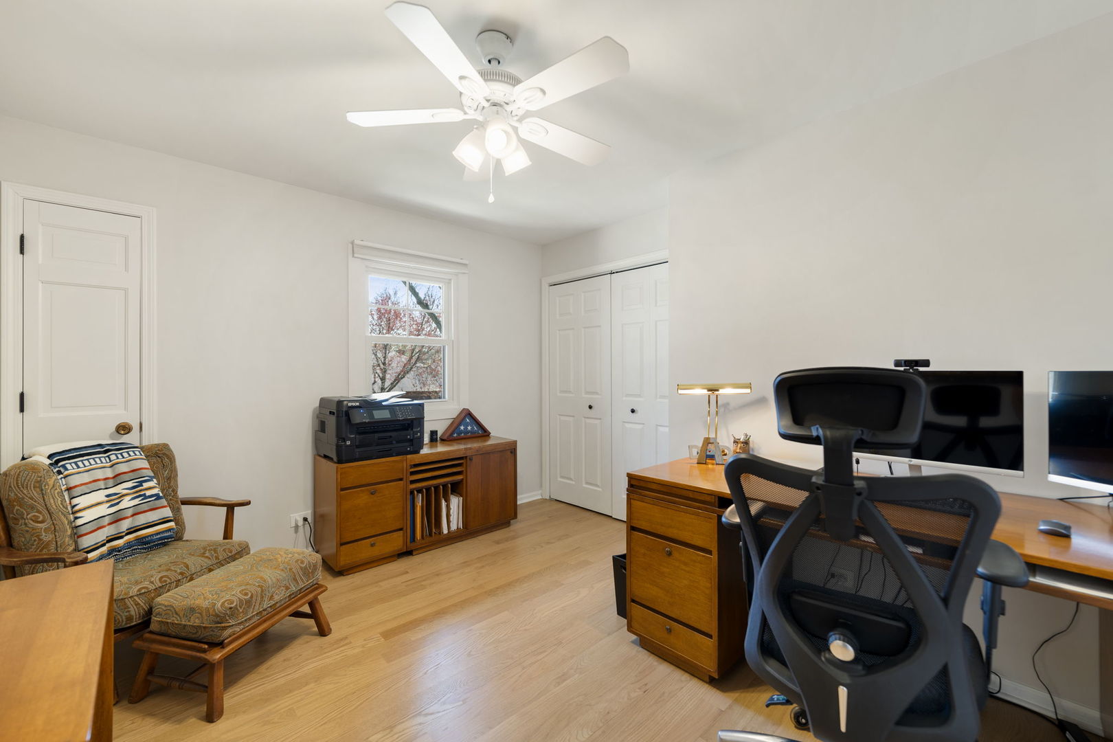 675 Cavalcade Circle Naperville, IL 60540 - Photo 39 of 58 a living room with furniture and wooden floor