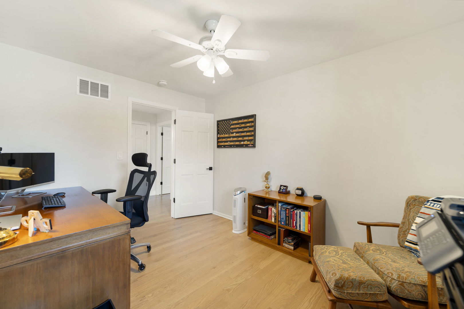 675 Cavalcade Circle Naperville, IL 60540 - Photo 40 of 58 a bed room with a bed and a chair