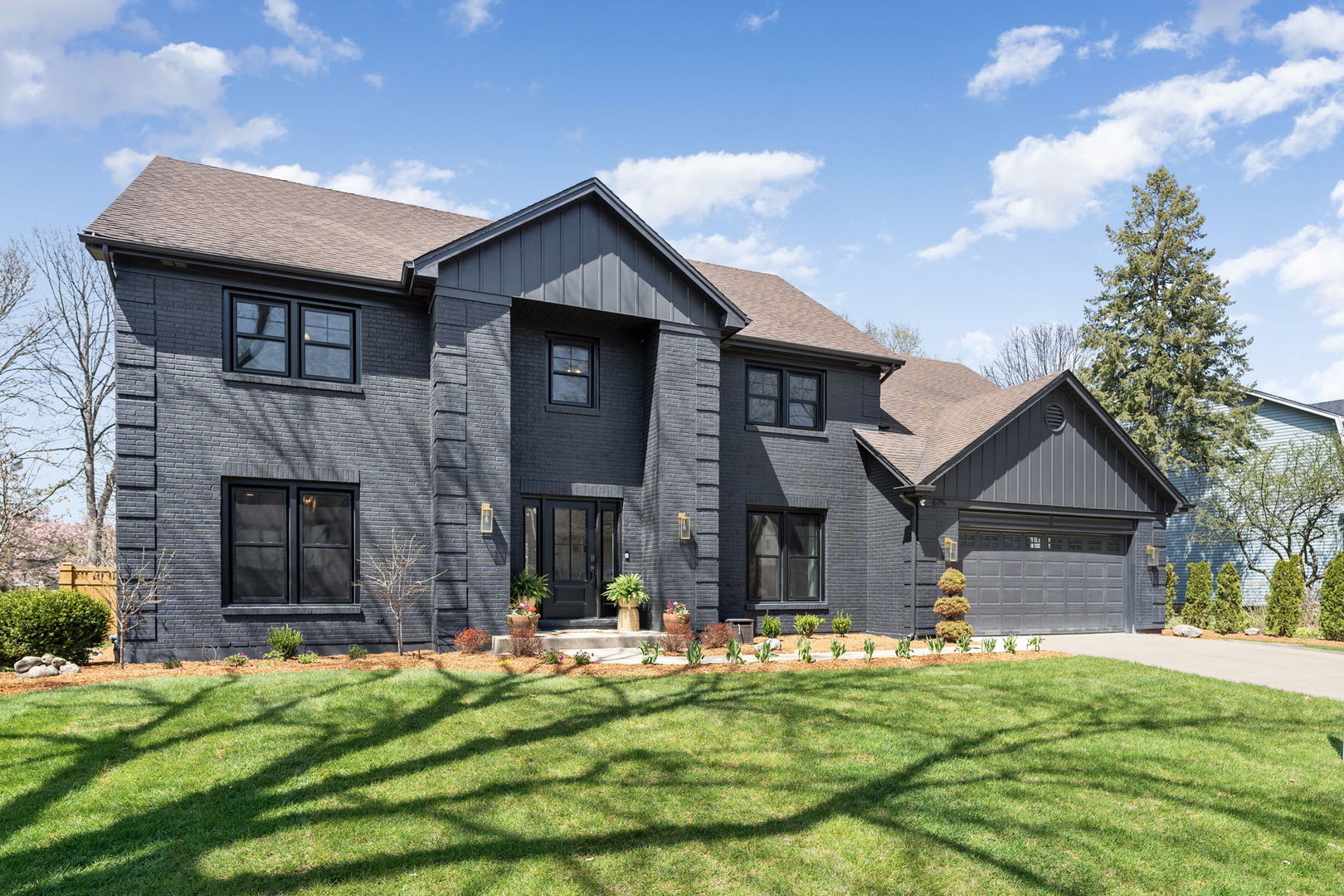 675 Cavalcade Circle Naperville, IL 60540 - Photo 52 of 58 a front view of a house with a yard
