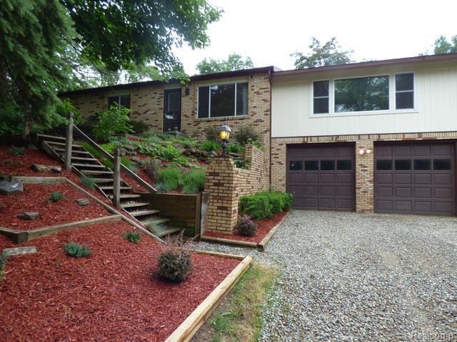 3982 Cordley Lake Road Pinckney, MI 48169 - Photo 19 of 22 19 LANDSCAPE.jpg