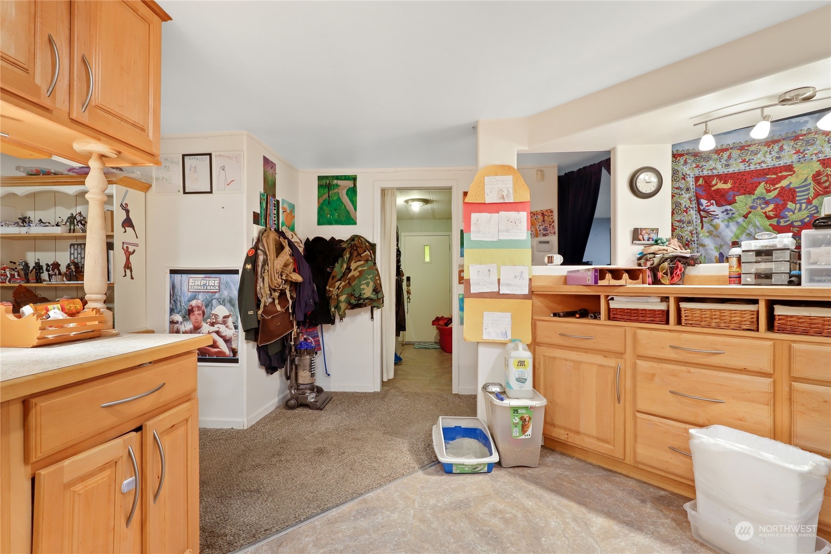 10909 Sidney Road Southwest Port Orchard, WA 98367 - Photo 13 of 34 a view of a kitchen with appliances and cabinets