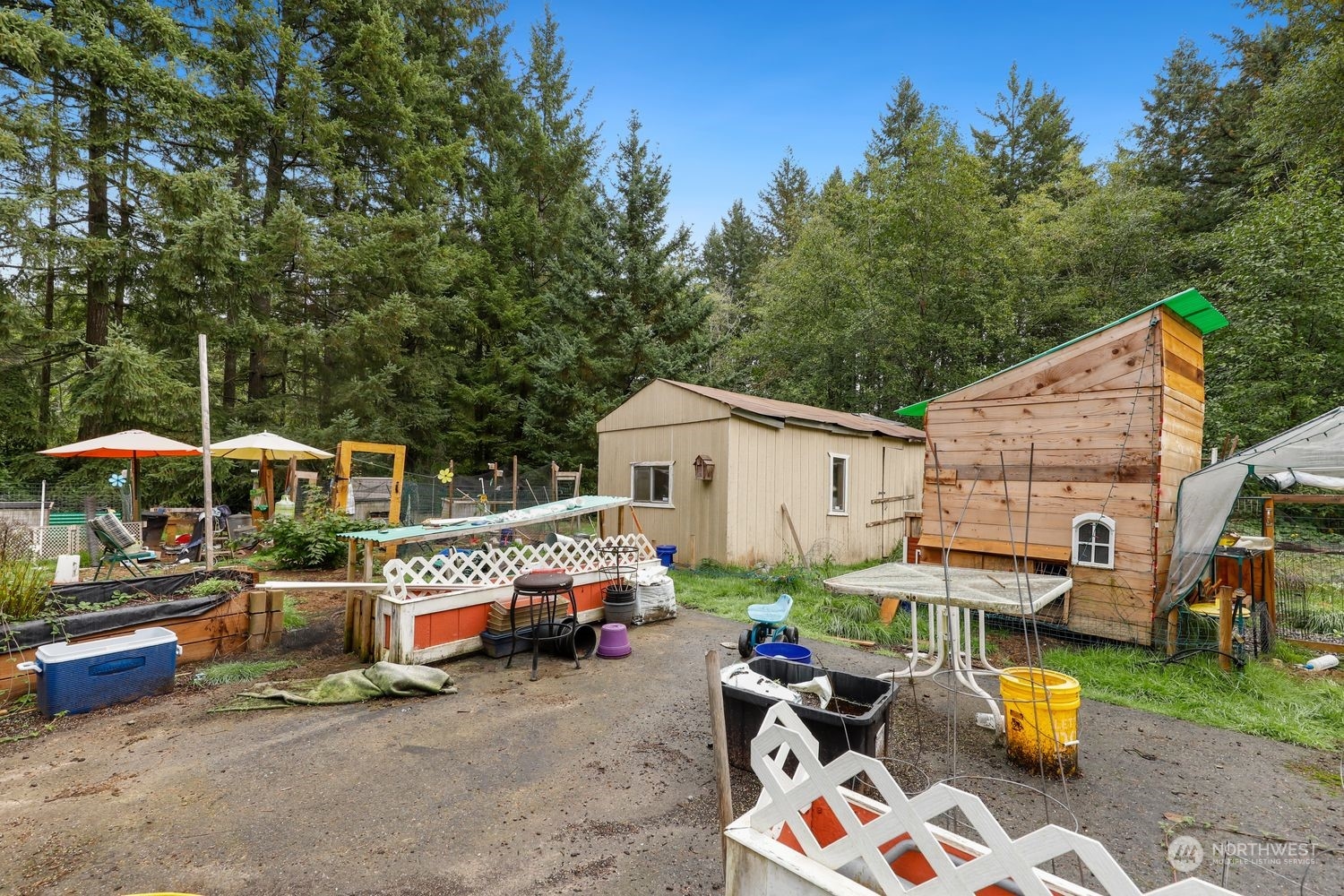 10909 Sidney Road Southwest Port Orchard, WA 98367 - Photo 26 of 34 a view of outdoor space yard and deck