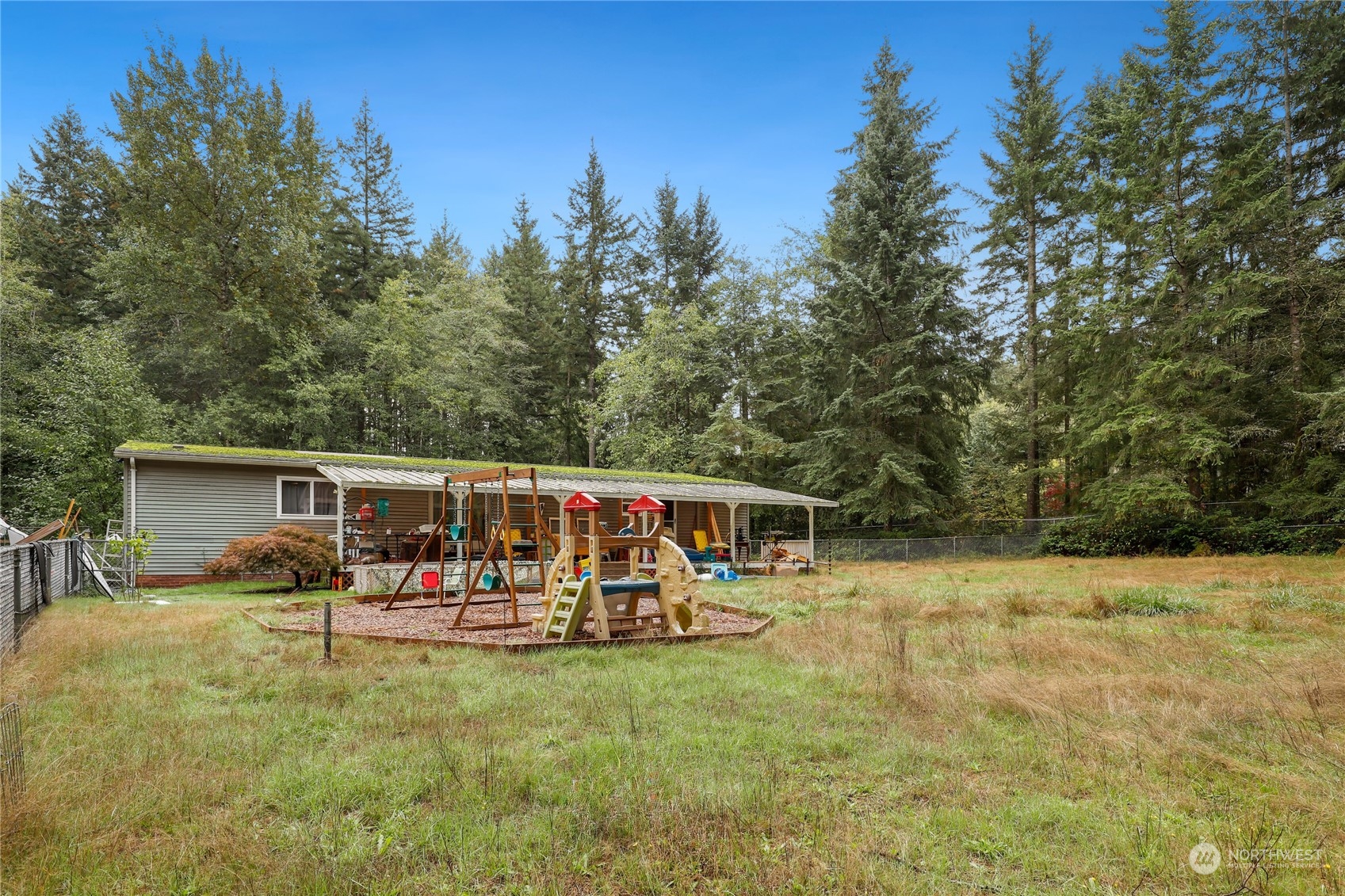 10909 Sidney Road Southwest Port Orchard, WA 98367 - Photo 31 of 34 a childrens park with lots of swings and slides