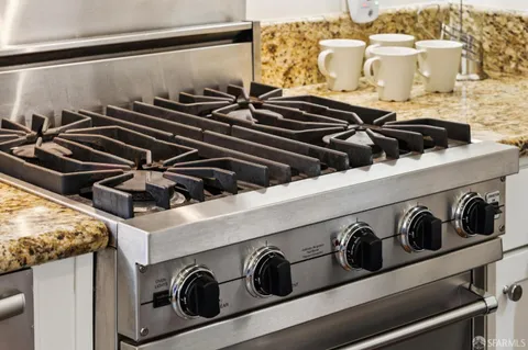 a close up of a stove top oven sitting on a counter