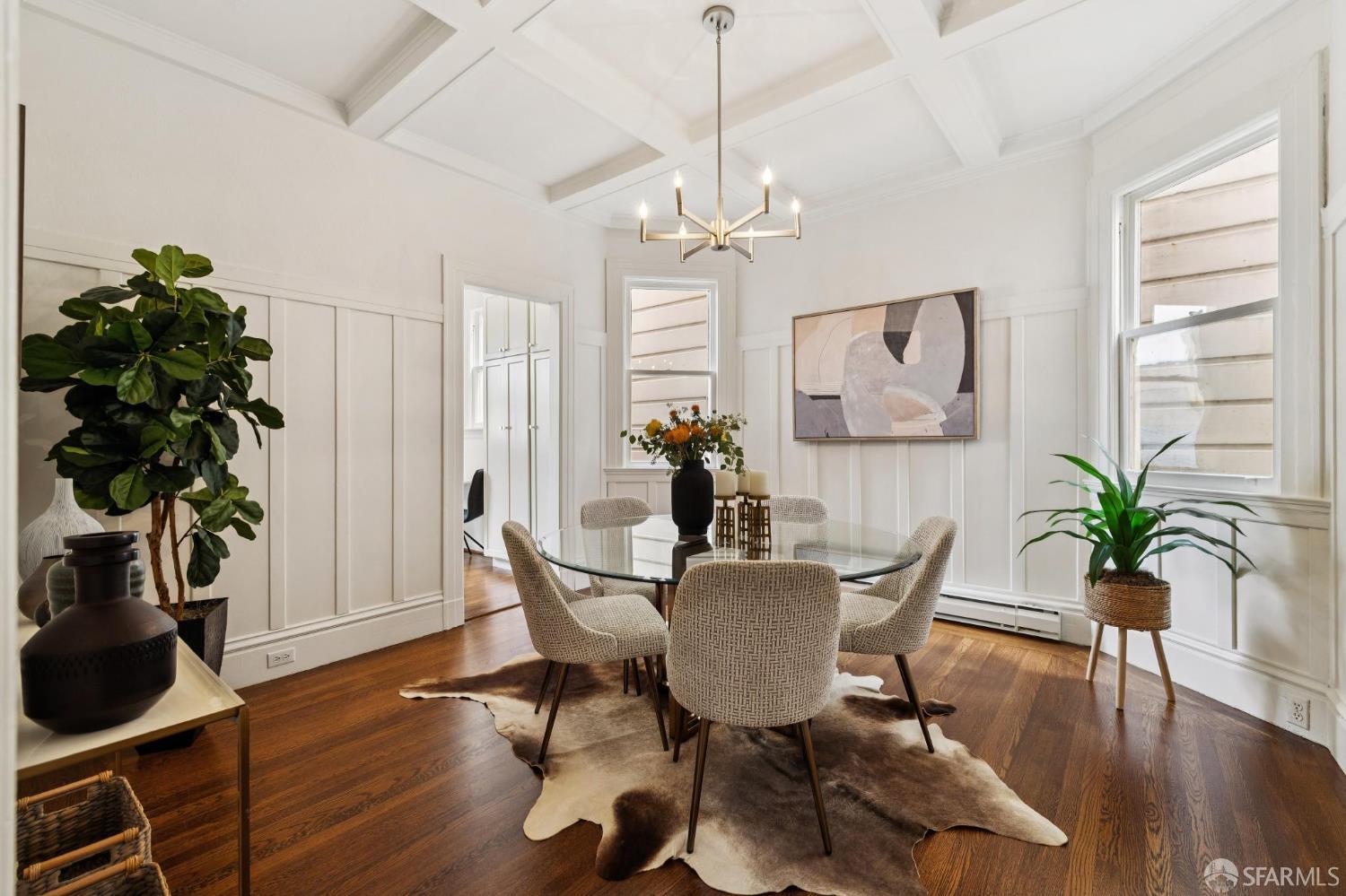 440 Laurel Street San Francisco, CA 94118 - Photo 14 of 24 a view of a dining room with furniture wooden floor and chandelier