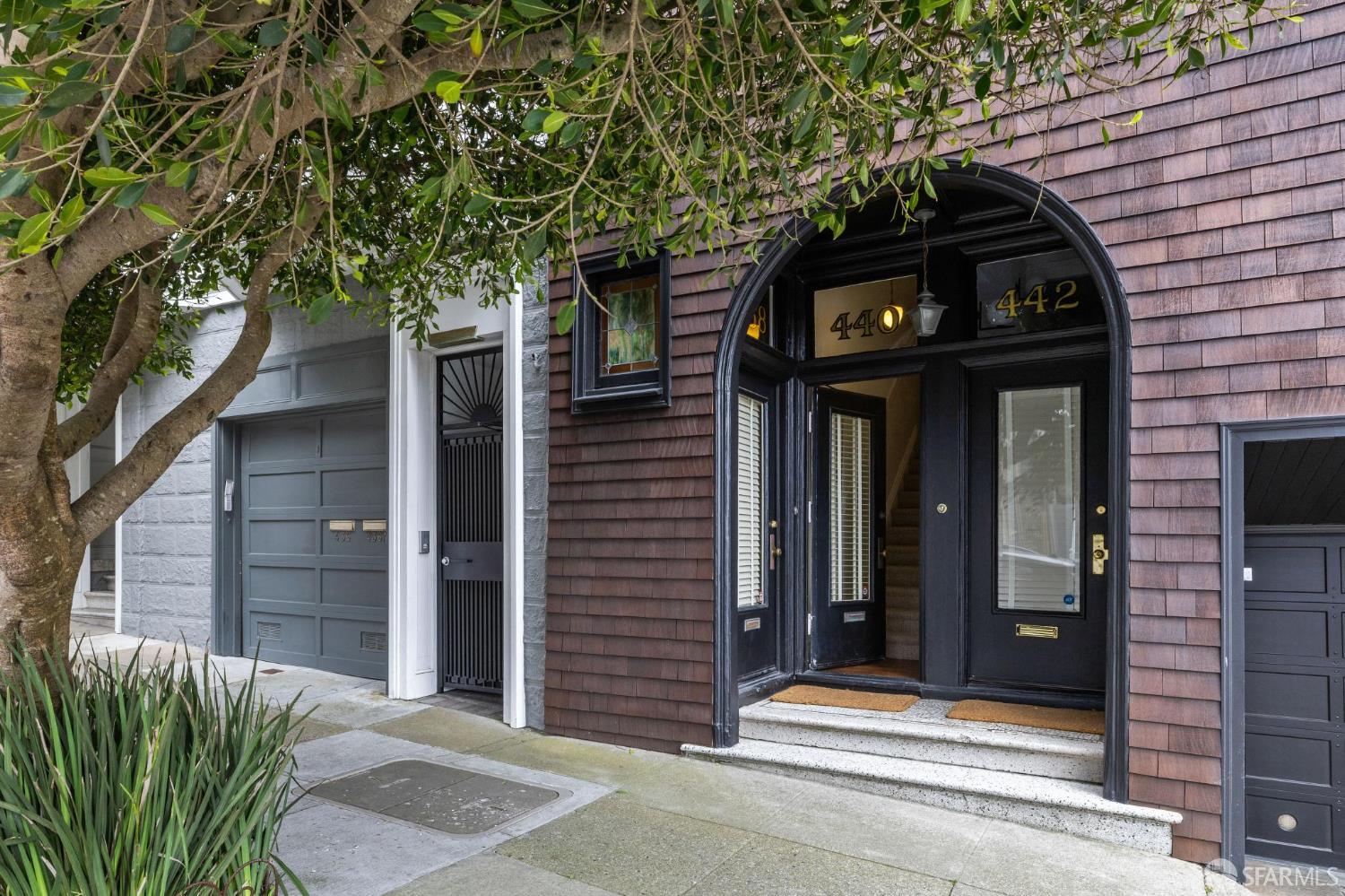 440 Laurel Street San Francisco, CA 94118 - Photo 2 of 24 a view of a wooden door of the house
