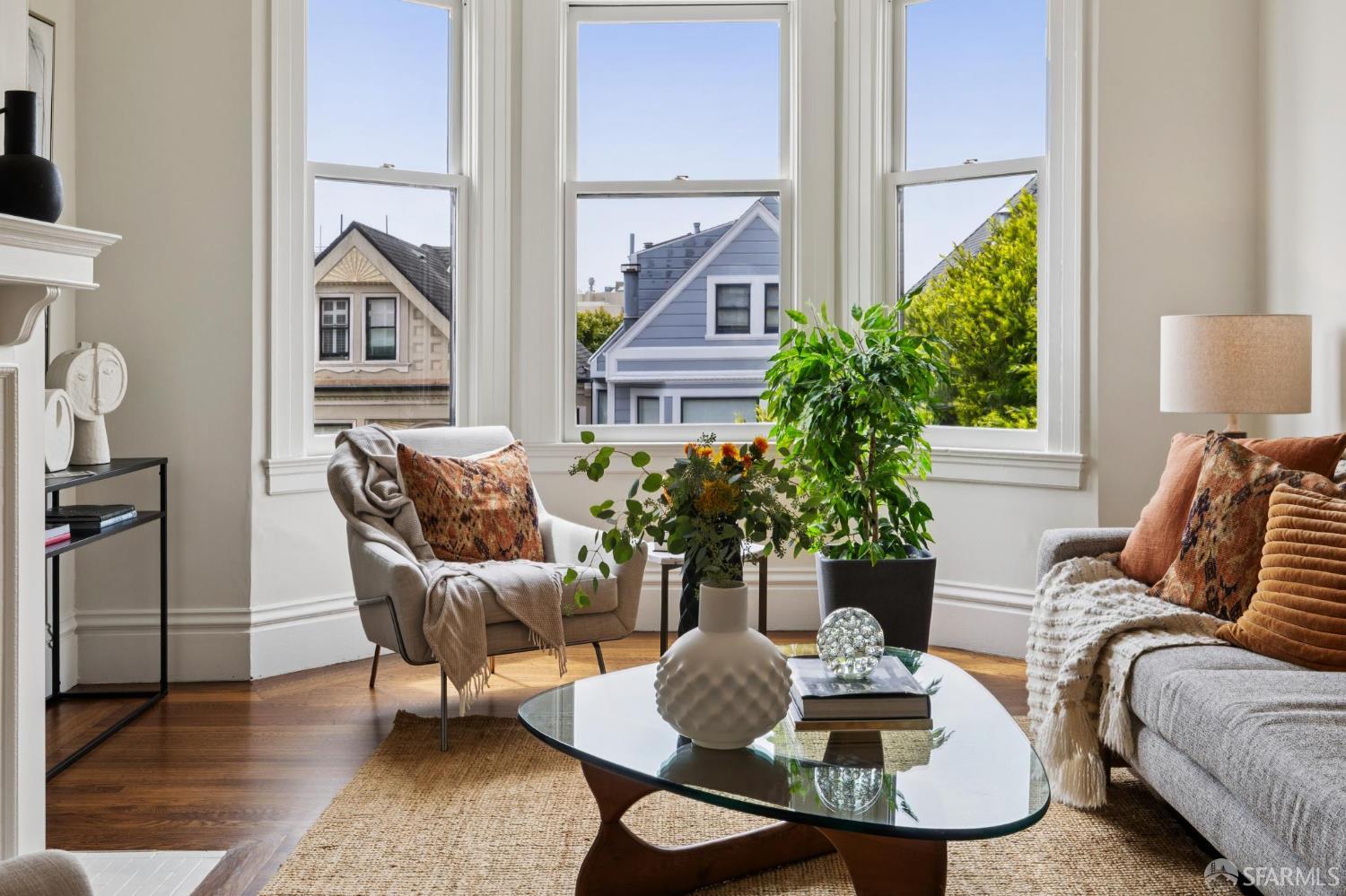440 Laurel Street San Francisco, CA 94118 - Photo 7 of 24 a living room with furniture and wooden floor