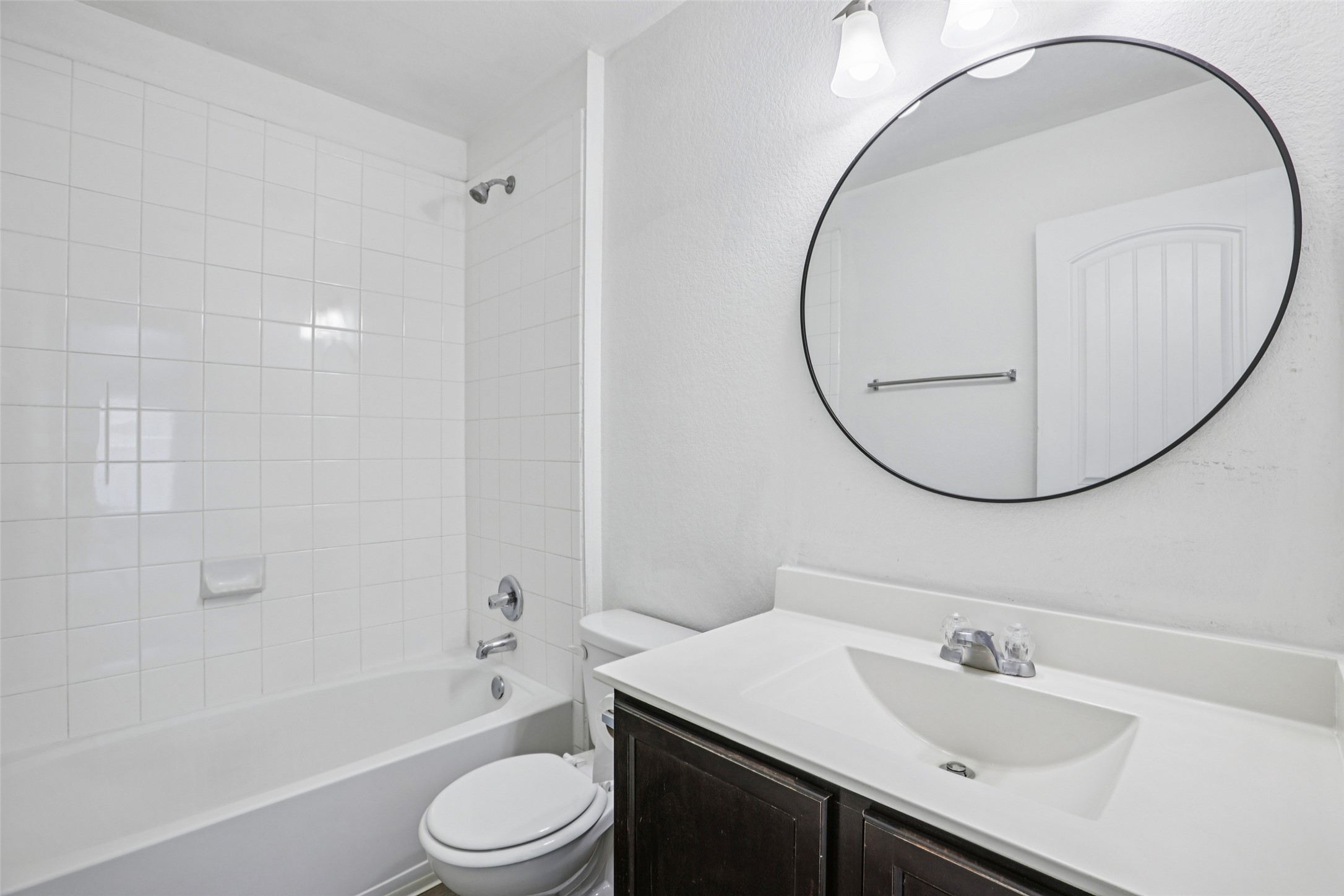 221 Alpha Kyle, TX 78640 - Photo 23 of 37 Full bath featuring vanity and shower combination