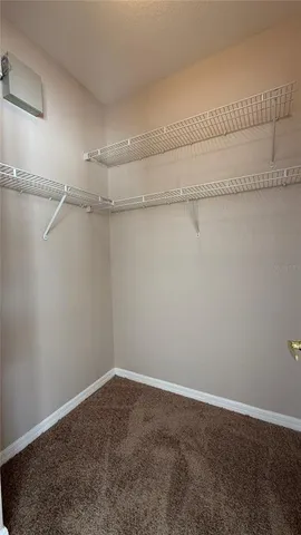 a view of a room with racks on the wall