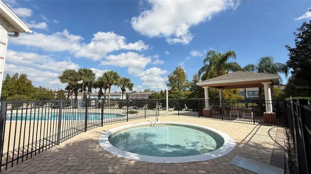 a swimming pool with a yard
