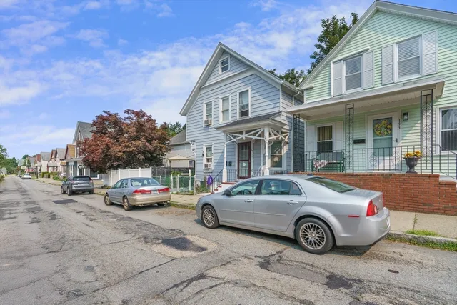 a car parked in front of a house