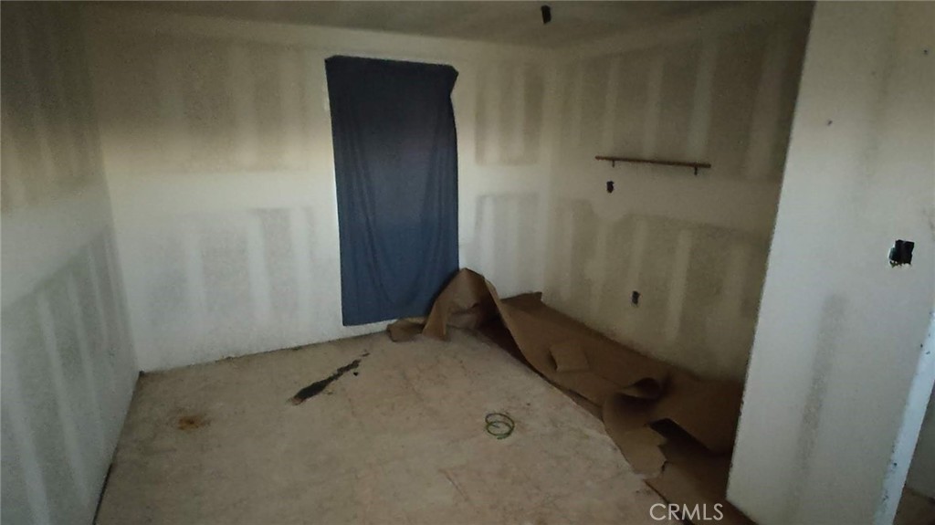 31576 Emerald Road Lucerne Valley, CA 92356 - Photo 17 of 51 a view of a room with closet
