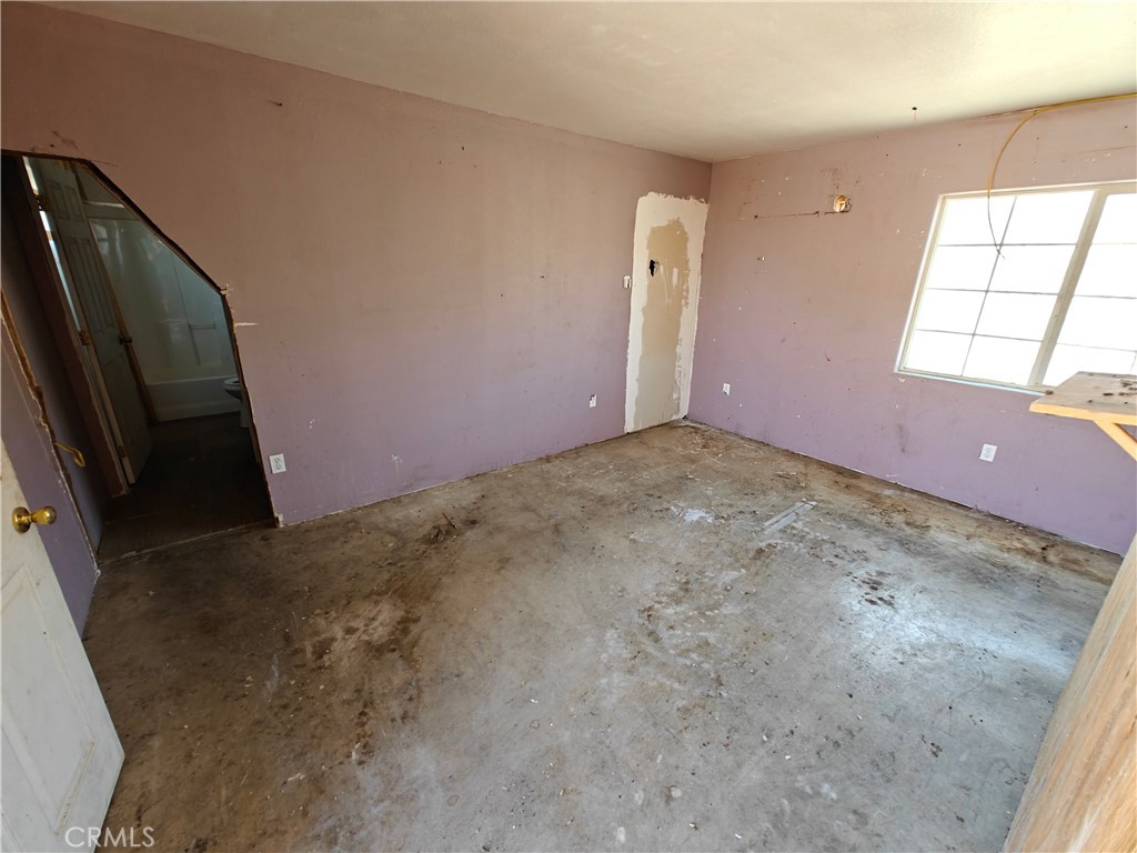 31576 Emerald Road Lucerne Valley, CA 92356 - Photo 20 of 51 a view of a livingroom with a fireplace