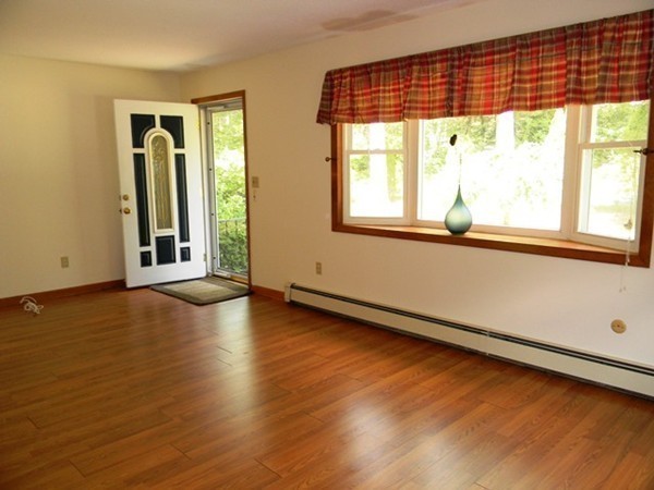 185 Athol Road Phillipston, MA 01331 - Photo 22 of 29 an empty room with wooden floor and windows
