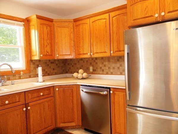 185 Athol Road Phillipston, MA 01331 - Photo 4 of 29 a kitchen with stainless steel appliances granite countertop a refrigerator a sink and white cabinets