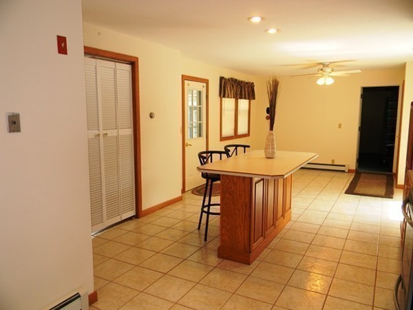 185 Athol Road Phillipston, MA 01331 - Photo 8 of 29 a view of a kitchen with furniture and a refrigerator