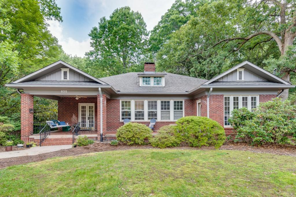825 Clairemont Avenue Decatur, GA 30030 - Photo 1 of 1 a front view of a house with a yard