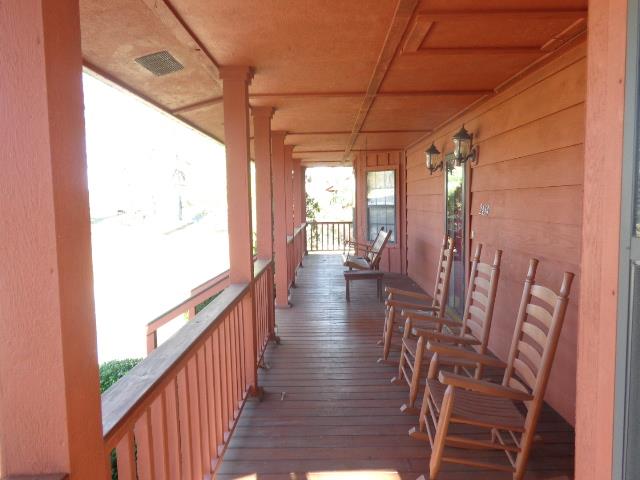 2434 Toler Road Woodlawn, TN 37191 - Photo 1 of 20 Relax in the swing or rock your cares away with your favorite beverage.