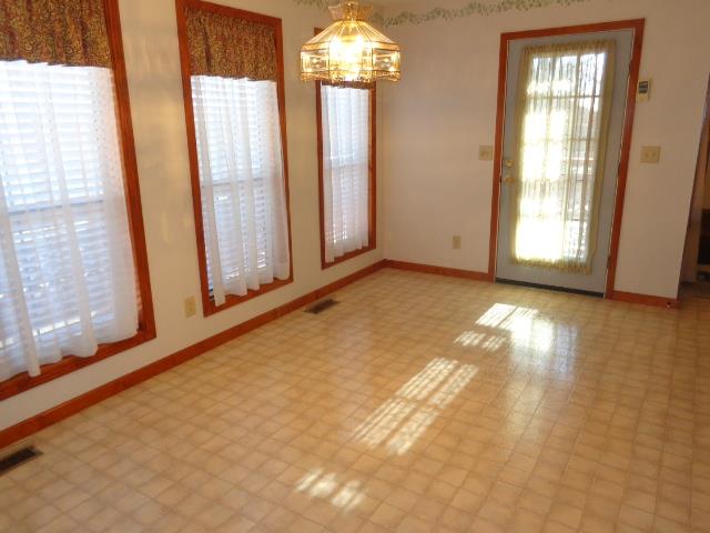 2434 Toler Road Woodlawn, TN 37191 - Photo 14 of 20 Another view of the dining area which opens to the living room.