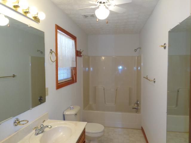 2434 Toler Road Woodlawn, TN 37191 - Photo 17 of 20 Master bath even has ceiling fan! tub shower combo
