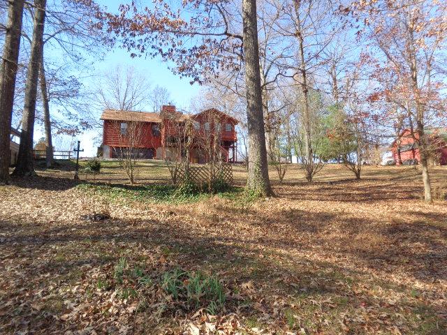 2434 Toler Road Woodlawn, TN 37191 - Photo 20 of 20 Tons of room for animals and children to romp and play. One street in little to no traffic. Roof was replaced 6 years ago. Come view this home, tons more features just to much to mention. Seller does have survey.