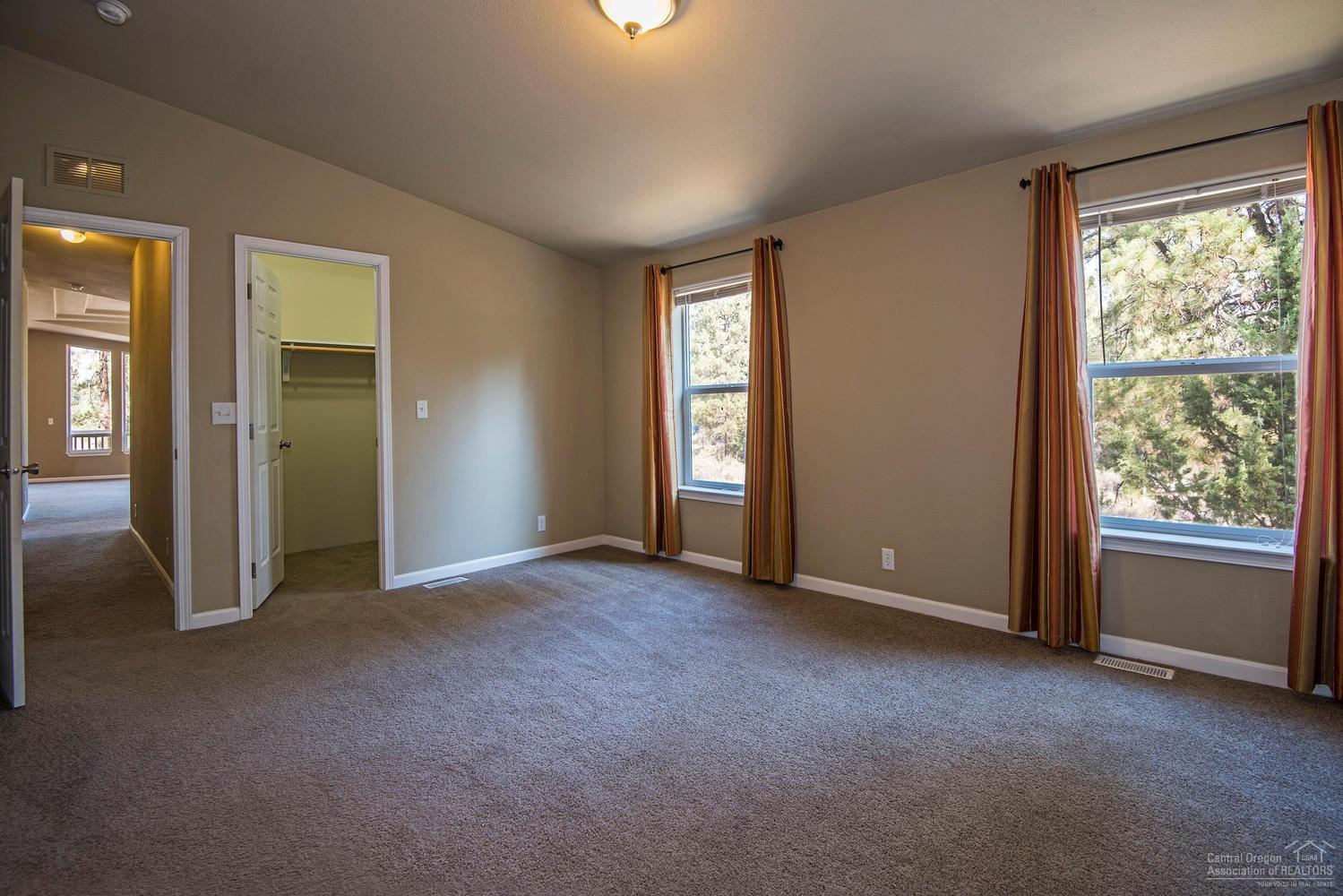 19770 Buck Canyon Road Bend, OR 97702 - Photo 11 of 23 The luxury sized master suite enjoys tre