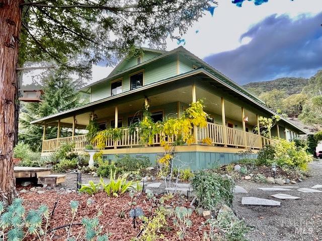 1455 Oak Knoll Road Ukiah, CA 95482 - Photo 29 of 54 The wrap around covered deck allows views from every side.