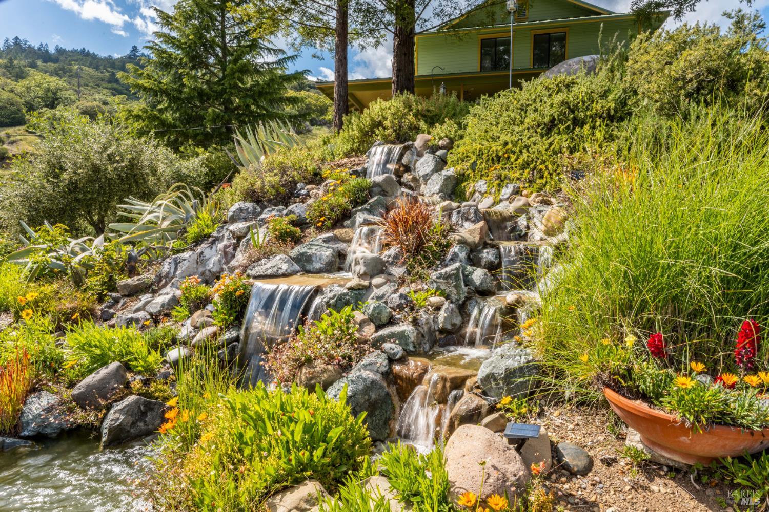 1455 Oak Knoll Road Ukiah, CA 95482 - Photo 35 of 54 A rock flowing waterfall creates moving energy to draw from.