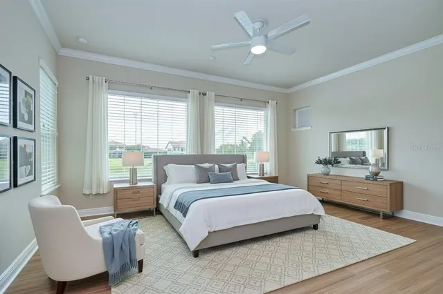 a bedroom with a large bed and a couch