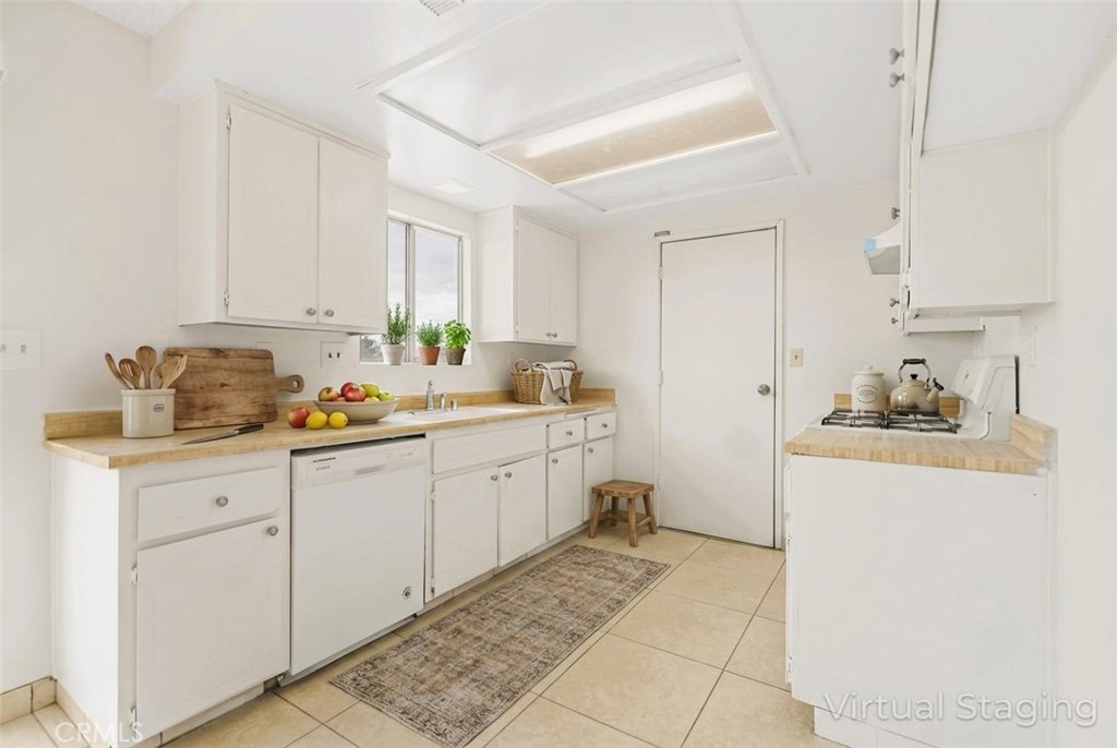 20209 Otoe Road Apple Valley, CA 92307 - Photo 14 of 32 a room with storage and utility