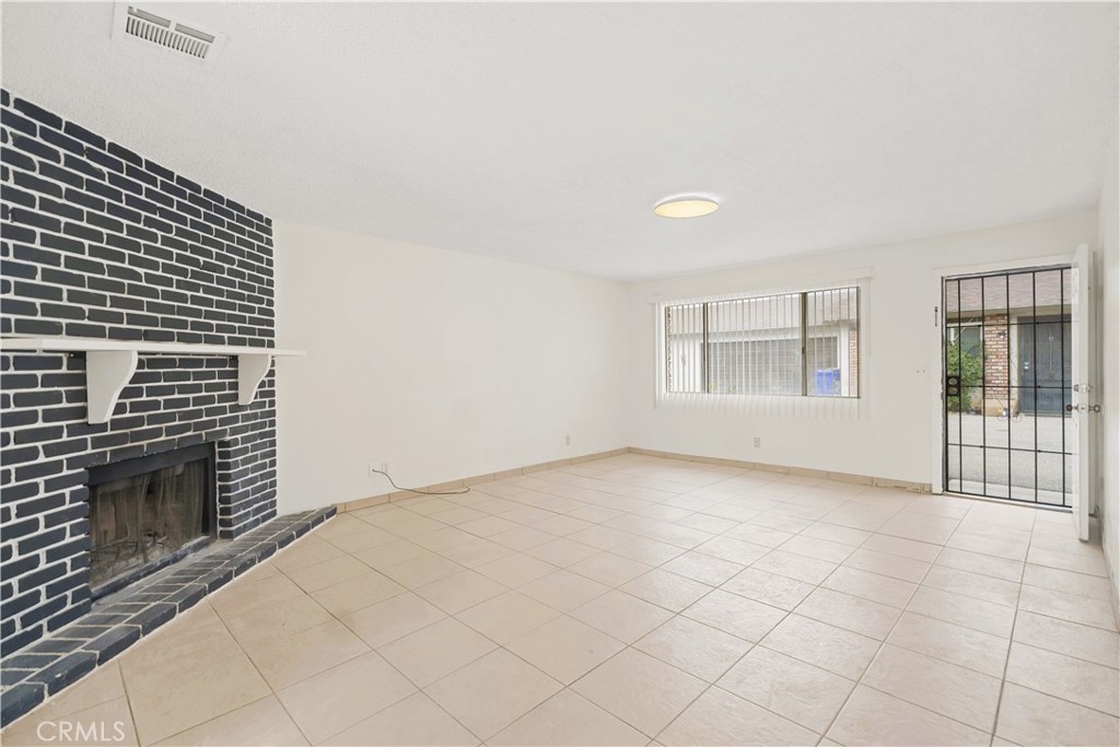 20209 Otoe Road Apple Valley, CA 92307 - Photo 17 of 32 a view of an empty room with windows