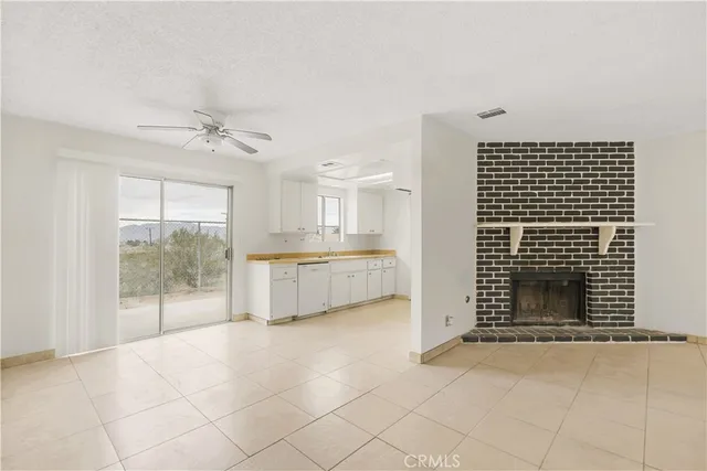 a kitchen with cabinets and white appliances