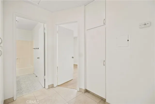 an empty room with a empty space and window