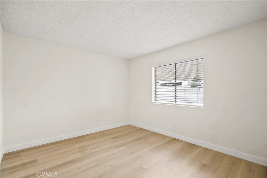 20209 Otoe Road Apple Valley, CA 92307 - Photo 27 of 32 an empty room with a empty space and window