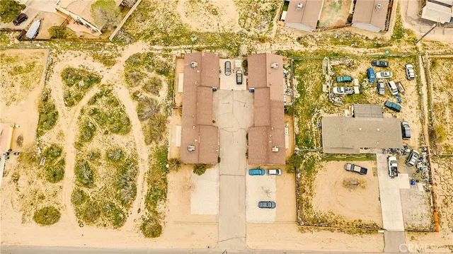 a front view of a building with a road