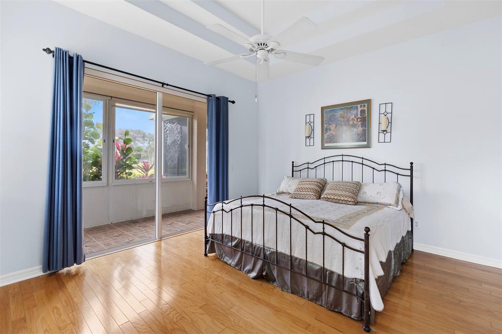 11 Winghaven Lane Fort Pierce, FL 34949 - Photo 15 of 50 a bedroom with a bed and a window