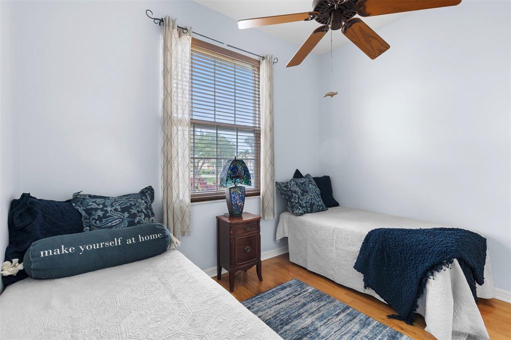 11 Winghaven Lane Fort Pierce, FL 34949 - Photo 20 of 50 a bedroom with a bed couch and window