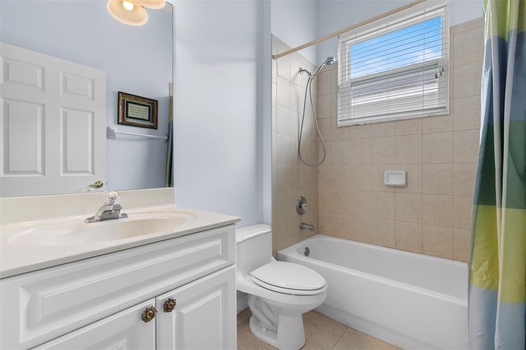 11 Winghaven Lane Fort Pierce, FL 34949 - Photo 22 of 50 a bathroom with a sink a toilet and shower