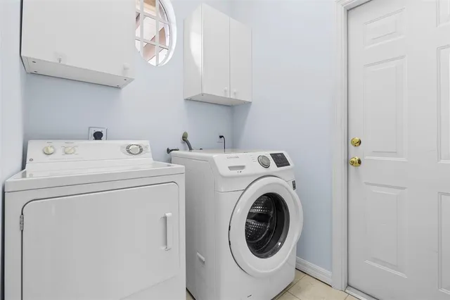 a view of a lake with a house in the background