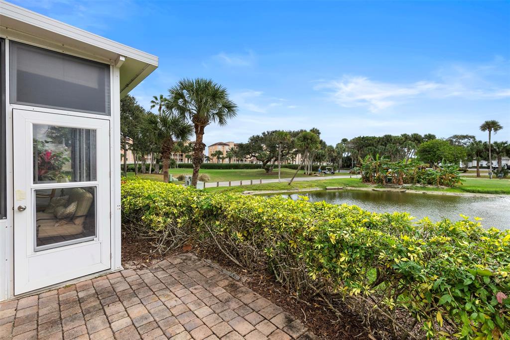 11 Winghaven Lane Fort Pierce, FL 34949 - Photo 28 of 50 a view of a lake with a house in the background