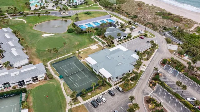 an aerial view of a swimming pool with outdoor space