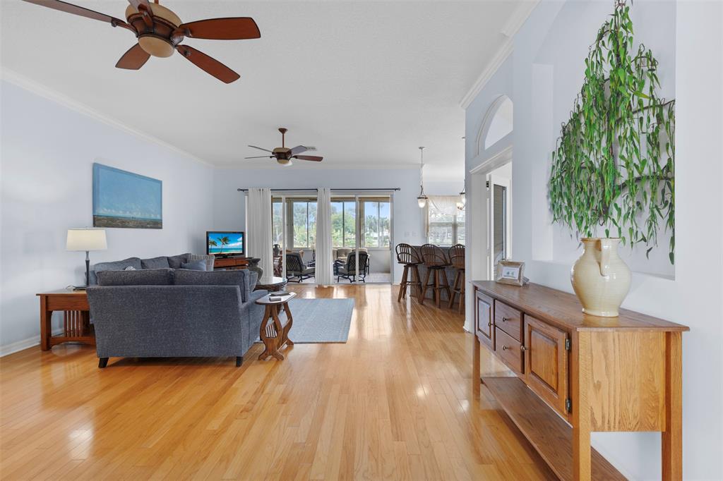 11 Winghaven Lane Fort Pierce, FL 34949 - Photo 10 of 50 a living room with furniture and a wooden floor