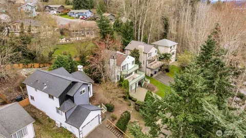 an aerial view of residential house with outdoor space